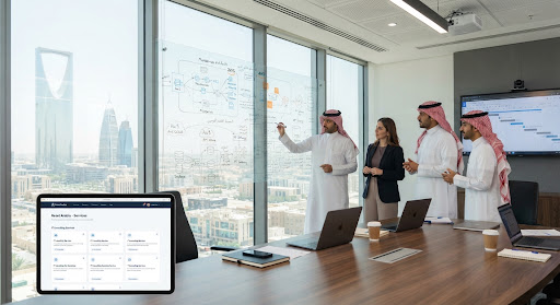 Software architects collaborating in a bright modern tech boardroom with architecture diagrams